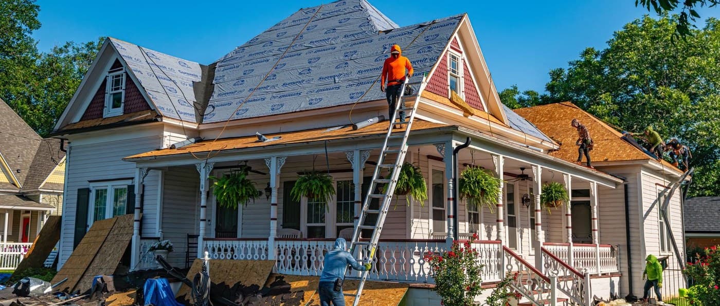 Representative residential roofline and exterior showing how multiple building surfaces meet
